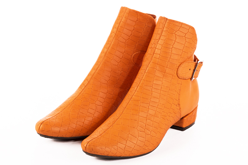 Apricot orange women's ankle boots with buckles at the back. Round toe. Low block heels. Front view - Florence KOOIJMAN